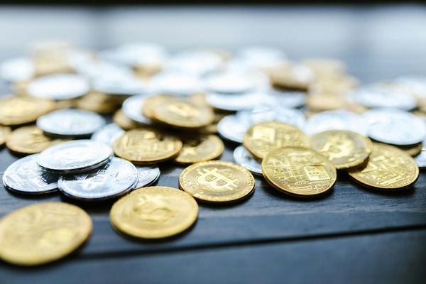 Pile of gold and silver cryptocurrency coins